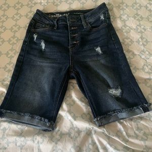 Distressed dark blue Bermuda Jean shorts